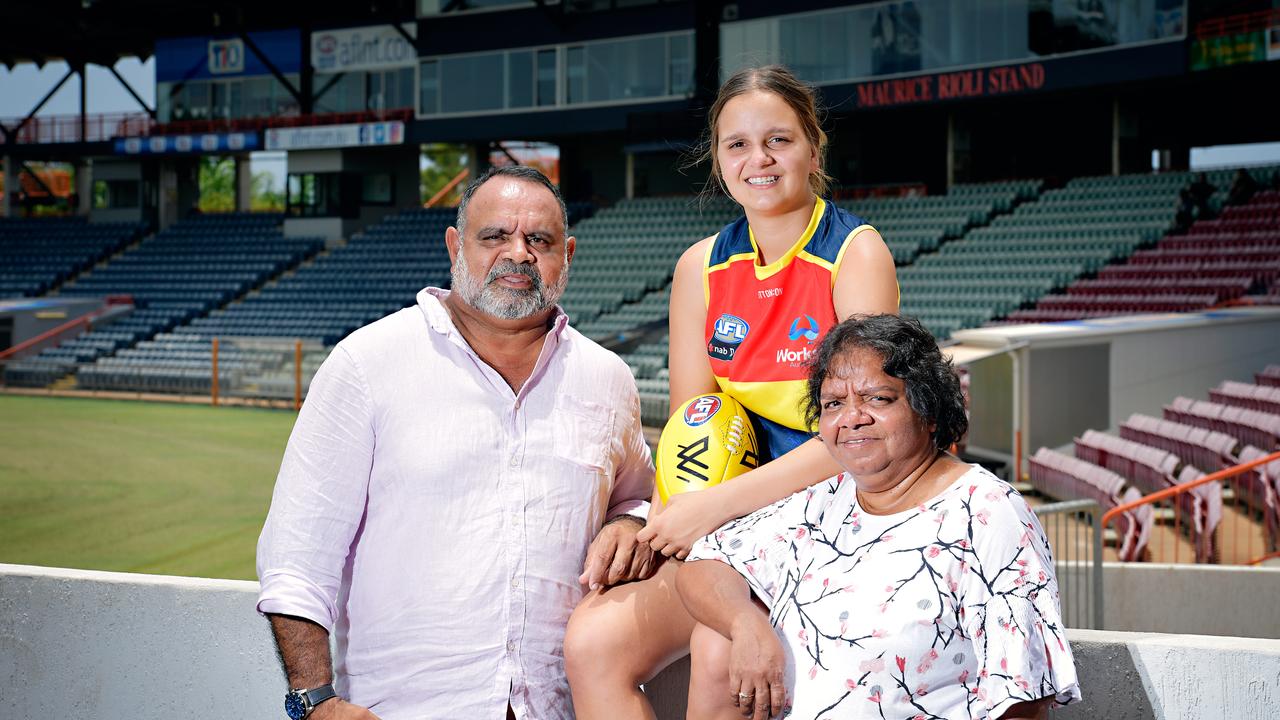 Danielle Ponter, with uncle Michael Long and mum Susie Long at TIO Stadium, has been drafted into the Adelaide Crows’ AFLW team. Picture: Michael Franchi