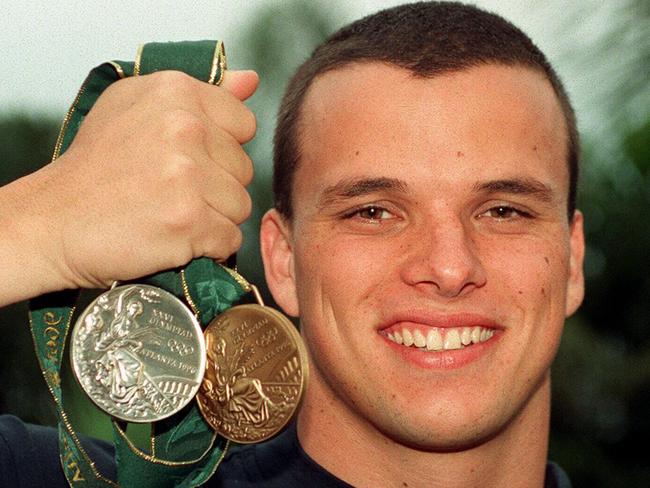 Scott Miller with his medals won during the 1996 Atlanta Olympic Games.