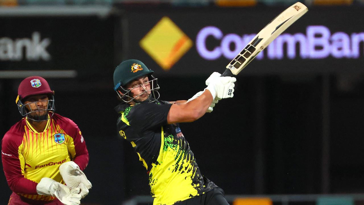 Tim David belted 42 off 20 balls as Australia defeated the Wests Indies at the Gabba. Picture: Patrick Hamilton/AFP