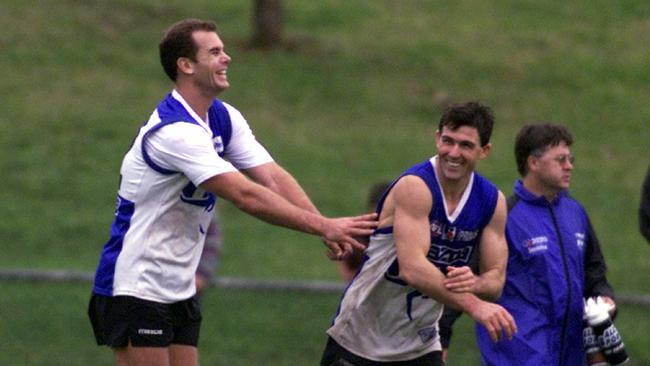 Wayne Carey and Anthony Stevens in happier times.