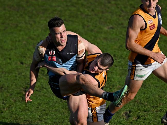 AberfeldieÃs Stefan Rasinac and StrathmoreÃs Brendan Butler during the EDFL Premier Division grand final between Aberfeldie and Strathmore at Windy Hill Oval in Essendon, Saturday, Sept. 10, 2022. Picture: Andy Brownbill