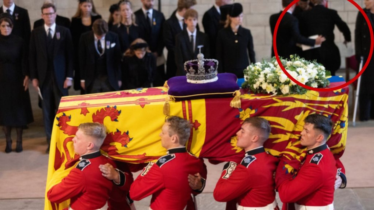 A commotion is seen in the background as Lady Gabriella Windsor appears to faint (Photo Darren Fletcher - WPA Pool/Getty Images)