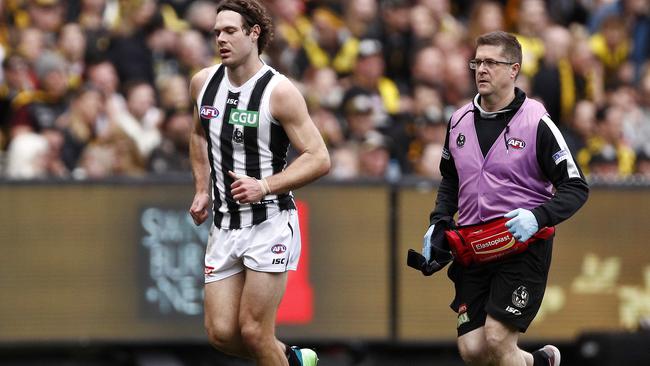 Matthew Scharenberg is helped from the field. Picture: AAP Images