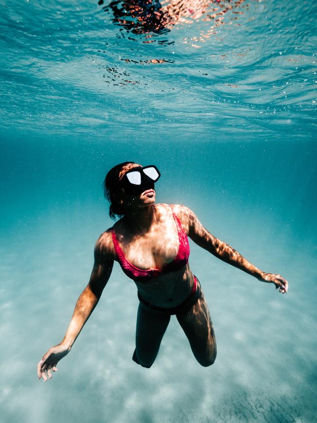 Aussie Sevens player Cassie Staples underwater at her hometown Batemans Bay. Picture: Joshua Burkinshaw