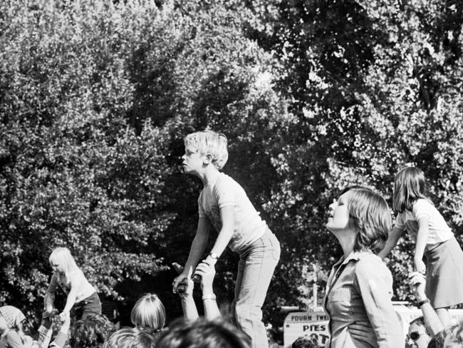 Some of the 20,000 fans trying to see and hear ABBA from *outside* the Music Bowl in Melbourne.