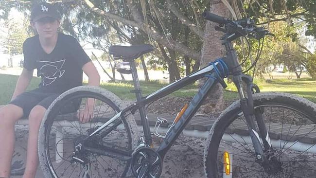 Tina Kalamara's son, 15, with his bike which missing from outside Southport police station on Saturday night. Picture: Tina Kalamara