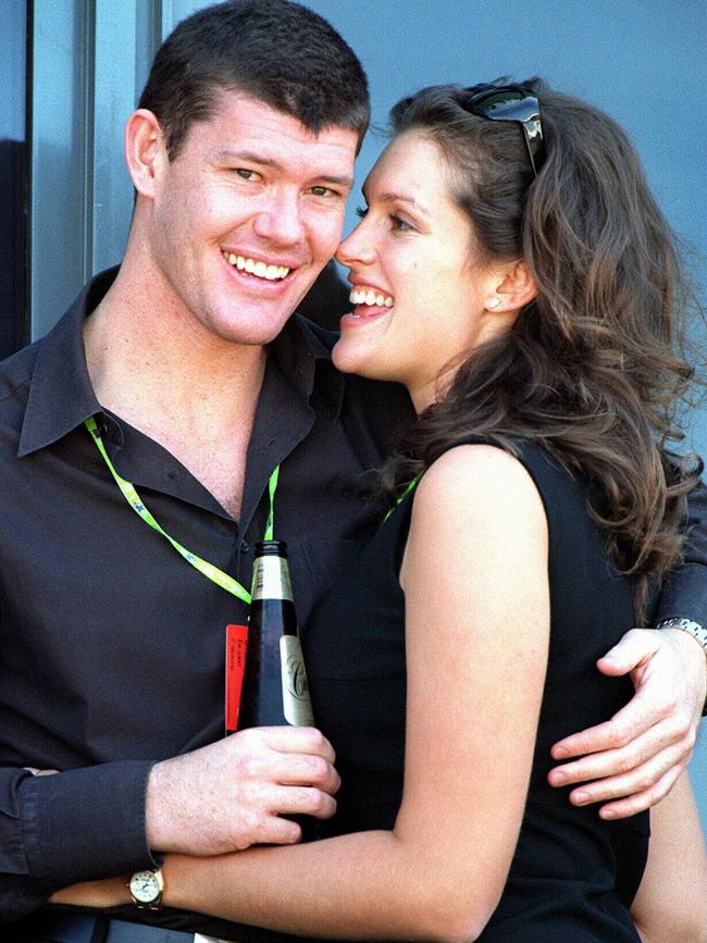 James with his then fiancee, Kate Fischer, at the 1998 Australian Grand Prix.