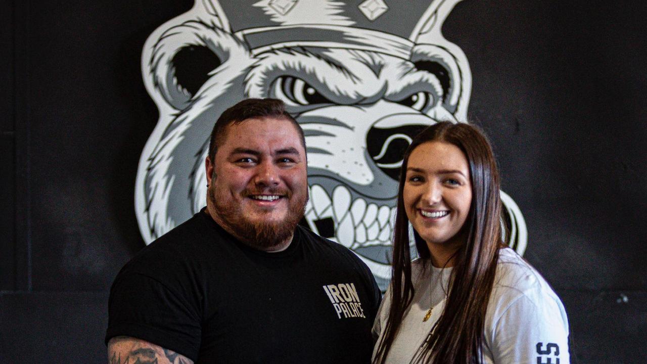 A Gympie-born couple, Mimi Rogers and Bradley Morris have overcome the challenges of Covid to open their own 'old-school' gym, Iron Palace, and their leap of faith is already starting to pay off. Picture: Iron Palace