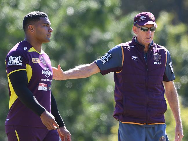 Tevita Pangai Junior and coach Wayne Bennett are seen during the Brisbane Broncos training session in Brisbane, Wednesday, August 22, 2018.  (AAP Image/Dave Hunt) NO ARCHIVING