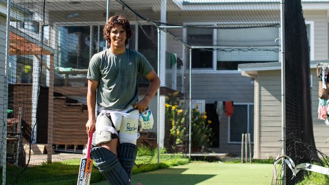 Sydney Thunder’s Ollie Davies gets some batting practice among the chickens in his backyard. Picture: Ian Bird