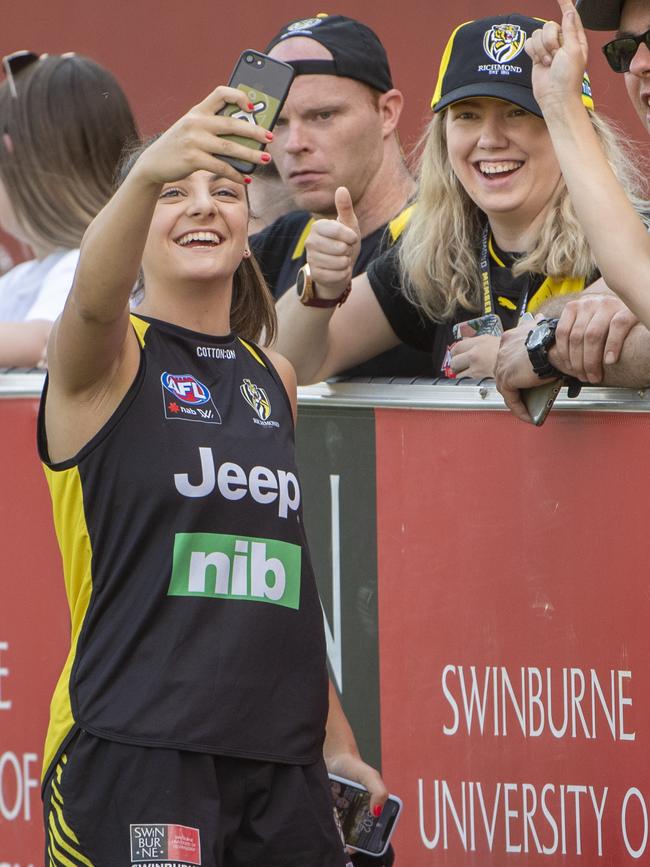 Monique Conti takes a selfie with the fans. Picture: Jay Town