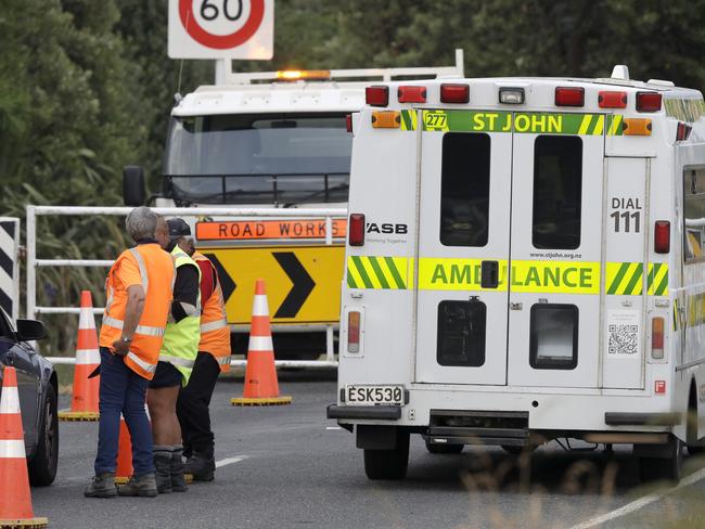 A ambulance arrives at Whakatane Airport, as the recovery operation to return the victims of the volcano eruption continues off the coast of Whakatane New Zealand. Picture: AP