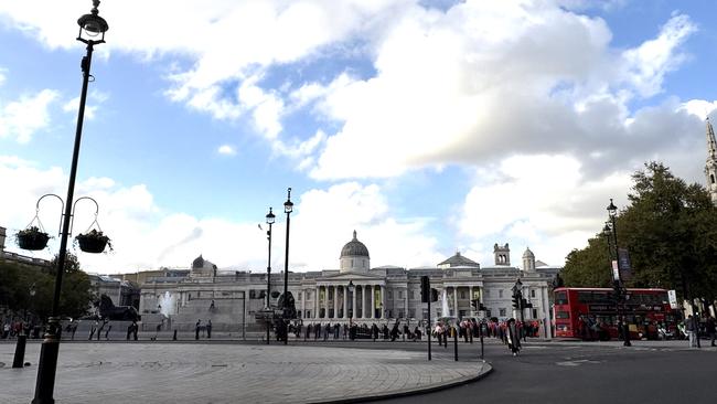 I was able to remove Nelson's Column and some of the crowd with Apple Intelligence's clean-up tool.