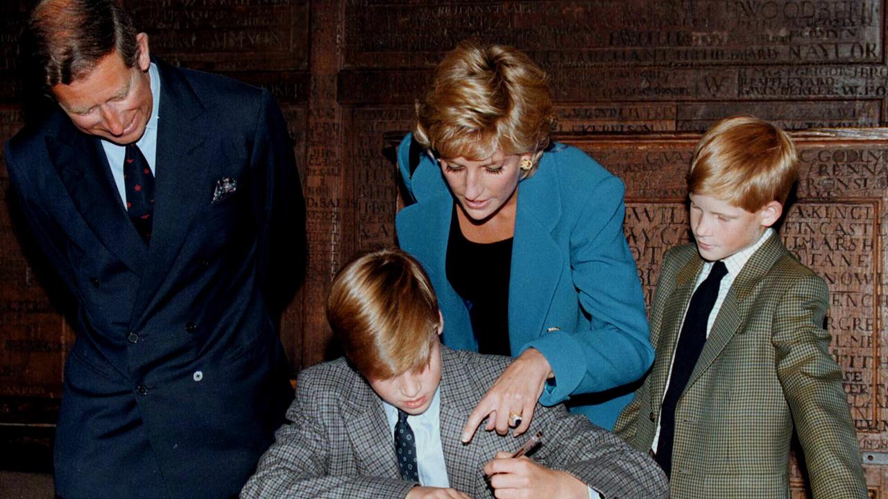 Prince William signing the entrance book at Eton College in 1995 with Prince Charles, Diana, Princess of Wales and Prince Harry watching.