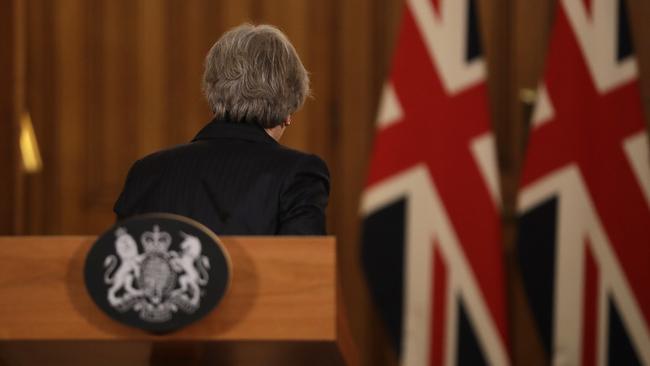 Britain's Prime Minister Theresa May, who faces a possible leadership challenge, leaves after her press conference inside 10 Downing Street.