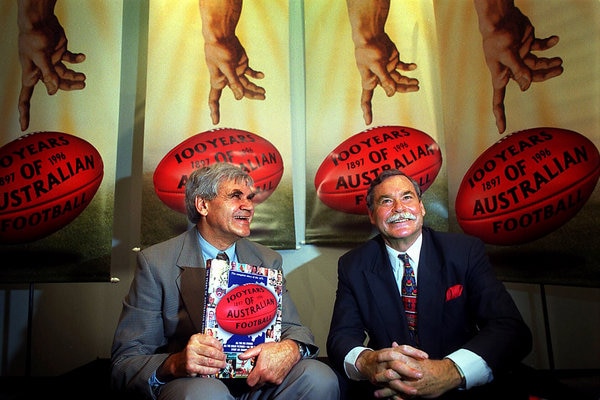 <p>7: GRAHAM 'POLLY' FARMER. Geelong legend Graham 'Polly' Farmer (L) and Ron Barassi at the launch of AFL's 100 Years Of Football book in 1996. Farmer played 101 games and captained the team for three seasons, before returning to Western Australia and leading West Perth Football Club as captain/coach to premierships against East Perth in 1969 and 1971. Pic. Graham Crouch</p>