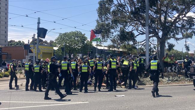 Dozens of police were on scene. Picture: Angus McIntyre