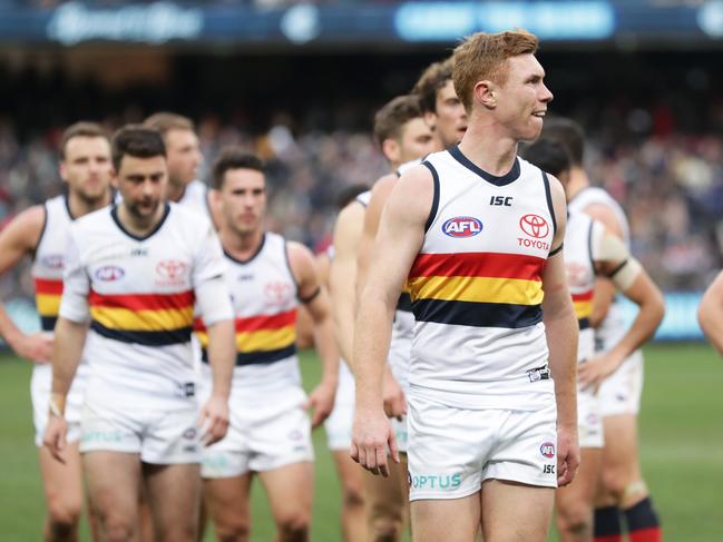 Tom Lynch of the Crows and teammates look dejected after their 27-point loss to Carlton at the MCG. Picture: MATT KING/GETTY IMAGES