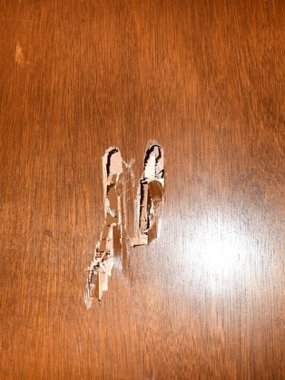 Hammer marks left on Asif Jamal’s room during the home invasion.