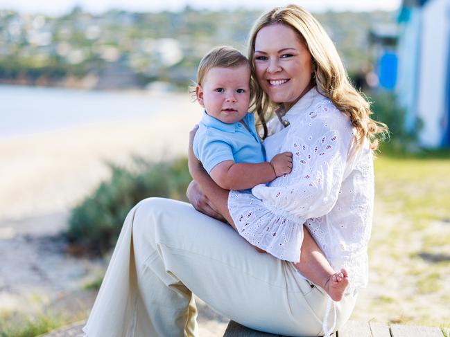 21/02/2025 Emily Rovere with her son Maverick at Safety Beach in Melbourne. Aaron Francis / The Australian