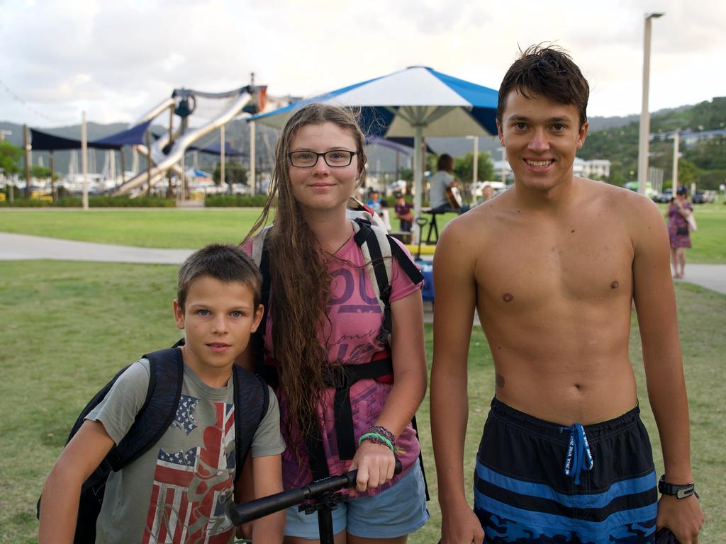 Timeo, 10 and Elina 16 of Switzerland and Michael 17 of Texas, USA, attending the Airlie Beach Festival of Music on Saturday, November 5, 2022. Picture: Katrina Lezaic