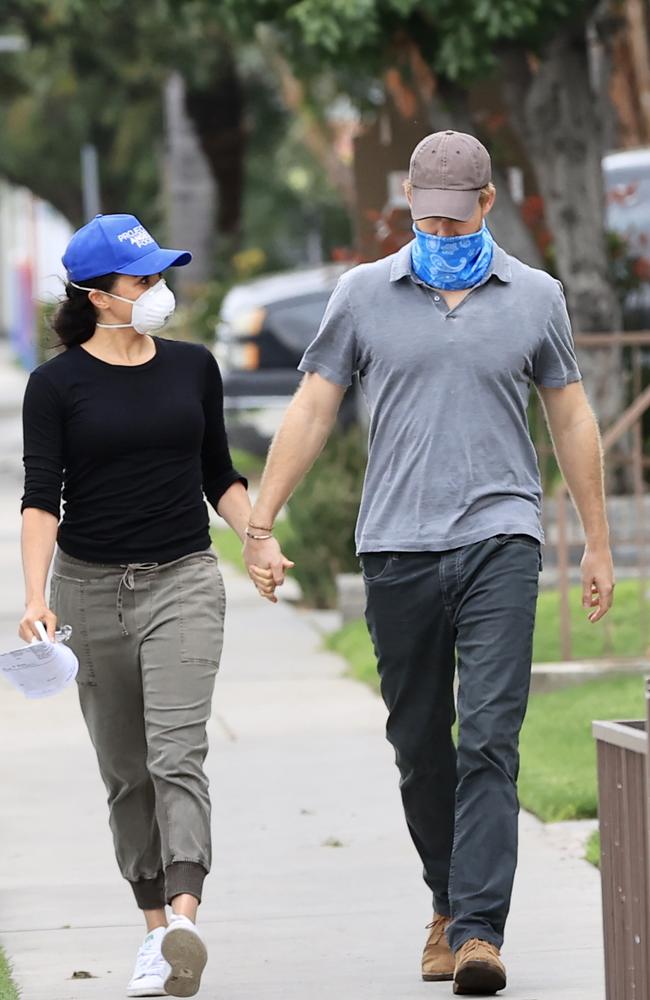 Meghan and Harry held hands as they undertook their duties.