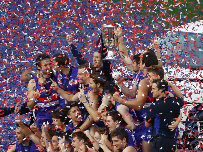 Murphy celebrates the 2016 flag with his Bulldogs teammates. Picture: George Salpigtidis