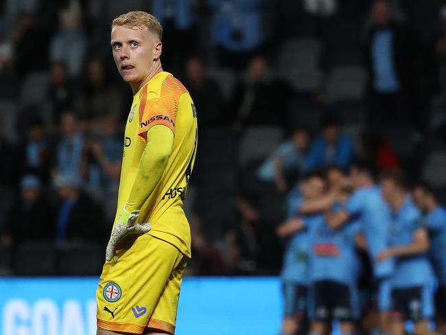 Tom Glover of Melbourne City looks on as Rhyan Grant of Sydney FC  celebrates scoring a goal in extra time during the A-League Grand Final between Sydney FC and Melbourne City at Bankwest Stadium, Parramatta. Picture: Brett Costello