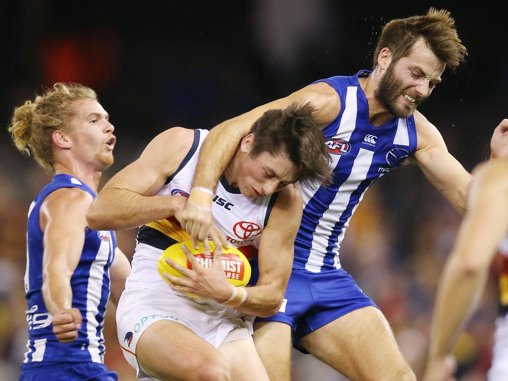 Adelaide's Chayce Jones was left dazed after this incident with Kanga Luke McDonald. Pic: Michael Klein.