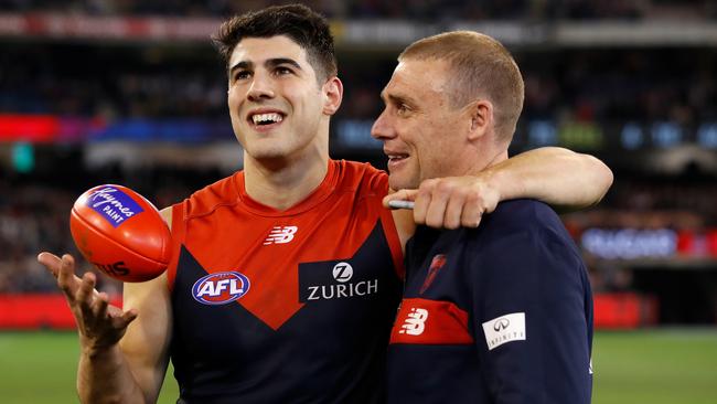 Christian Petracca celebrates Melbourne’s elimination final win with Simon Goodwin.