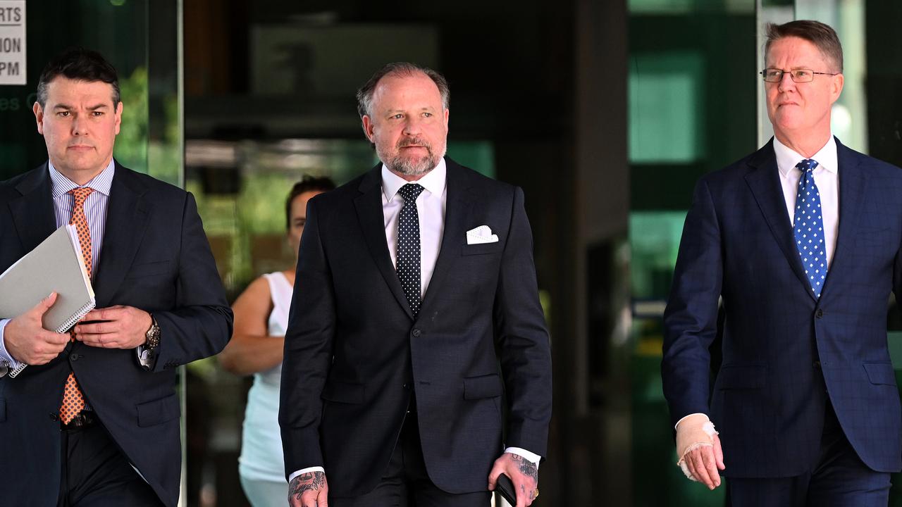 Campbell MacCallum (centre) leaves the Magistrates Court in Brisbane. Picture: Dan Peled