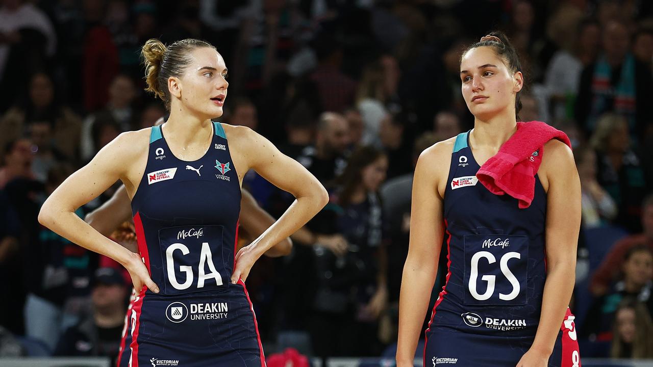 Kiera Austin (left) and Rahni Samason of the Vixens look dejected after the Super Netball semi-final loss. Photo: Getty Images