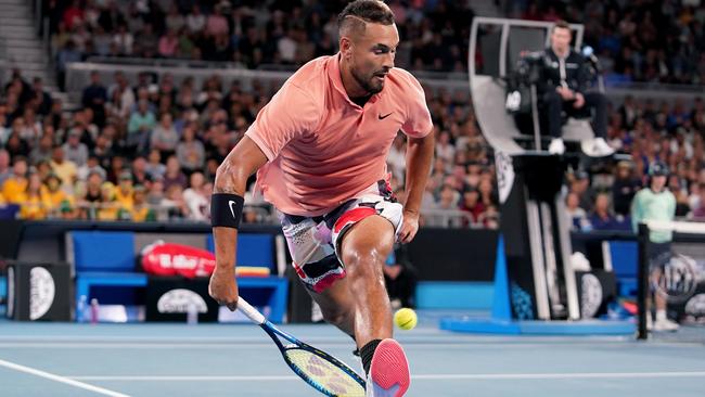 Nick Kyrgios returns a shot through his legs during his first round win over Lorenzo Sonego Picture: AAP