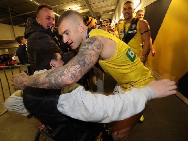 Dustin Martin hugs Will Murray after the Grand Final. Picture: Alex Coppel