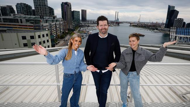 Marvel Stadium boss Scott Fitzgerald with Melissa De Corrado and Gabbie Farnham on the Marvel Stadium roof. Picture: Michael Willson/AFL Photos