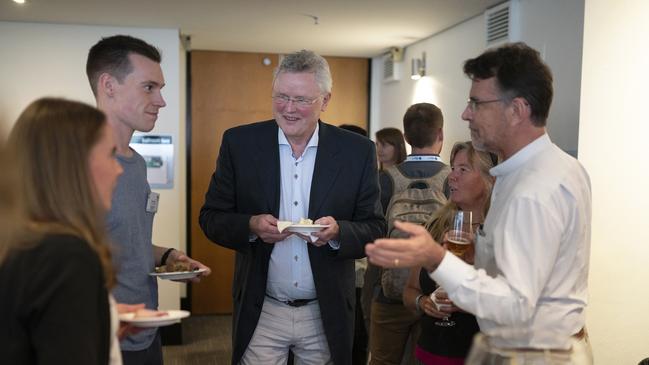 Ole Mouritsen, centre, in conversation after his talk at the Hotel Grand Chancellor in Hobart. Picture: BRAD HARRIS