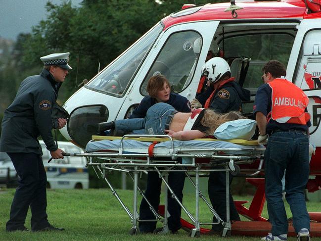 A victim arriving by helicopter after being shot by Martin Bryant.