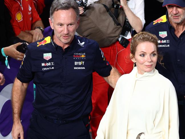 JEDDAH, SAUDI ARABIA - MARCH 09: Oracle Red Bull Racing Team Principal Christian Horner and Geri Horner react in parc ferme during the F1 Grand Prix of Saudi Arabia at Jeddah Corniche Circuit on March 09, 2024 in Jeddah, Saudi Arabia. (Photo by Clive Rose/Getty Images)