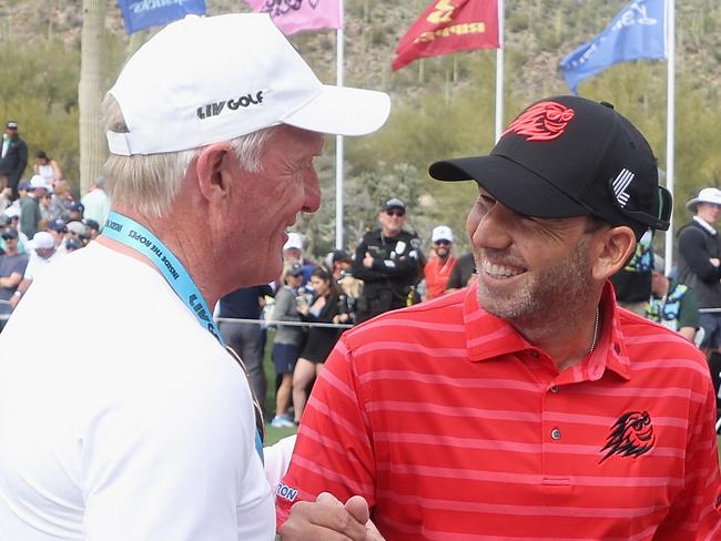 TUCSON, ARIZONA - MARCH 19: LIV Golf CEO; Greg Norman greets captain Sergio Garcia of Fireballs GC during Day Three of the LIV Golf Invitational - Tucson at The Gallery Golf Club on March 19, 2023 in Tucson, Arizona.   Christian Petersen/Getty Images/AFP (Photo by Christian Petersen / GETTY IMAGES NORTH AMERICA / Getty Images via AFP)