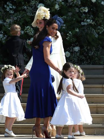 Jessica Mulroney in blue as she walked in to St George's Chapel... Picture: AFP