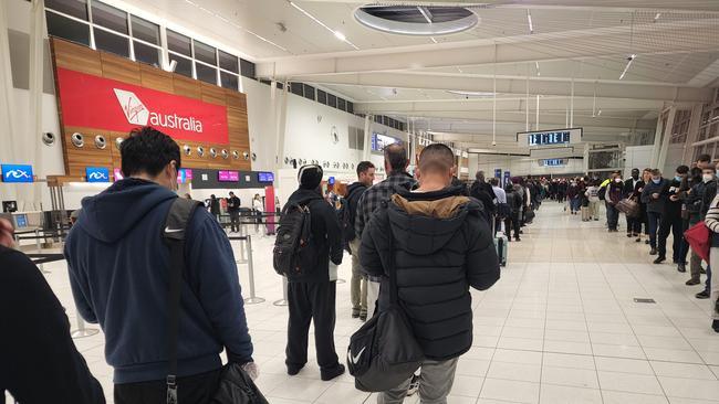 The queues on Tuesday morning. The advice for domestic travellers is to arrive two hours before a scheduled flight and three hours for international travellers.