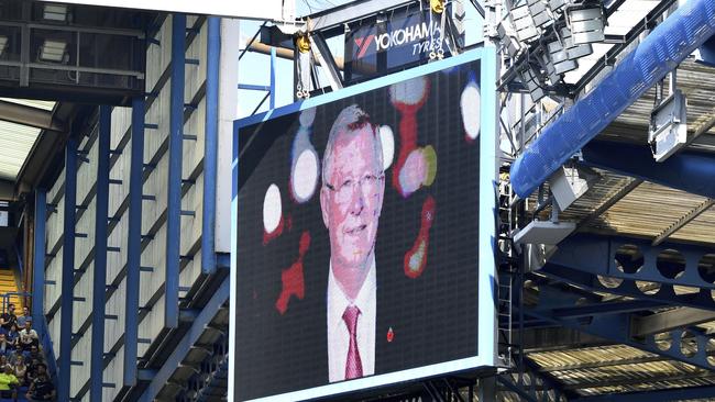 A tribute to Sir Alex Ferguson is displayed as the former Manchester United manager remains in intensive medical care, during the English Premier League match between Chelsea and Liverpool
