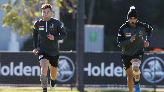 Rehab group regulars Elliott and Daniel Wells complete a running session at training. Picture: Michael Klein