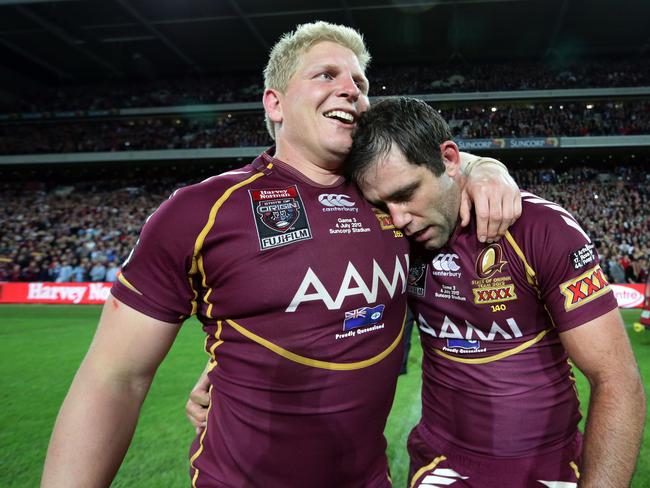 Hannant with former Queensland and Test teammate Cameron Smith in 2012. Picture: Adam Head