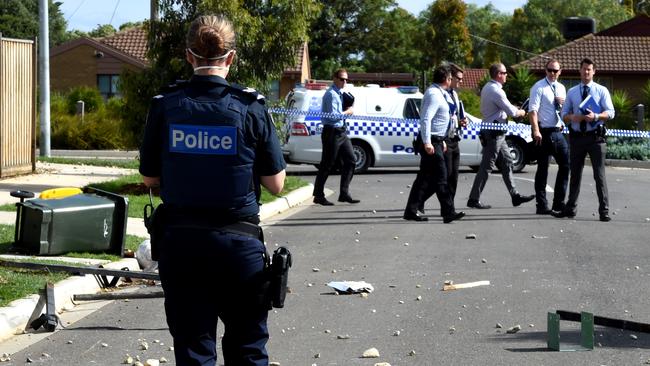 Rocks litter the street in Werribee after being thrown at police. Picture: Nicole Garmston