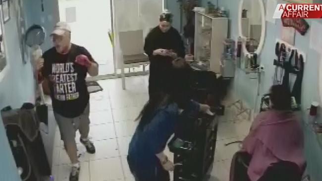 1. A bloodied Wayne Greenhalgh flees into a nearby Salon after the attack. Picture: A Current Affair/9NEWS