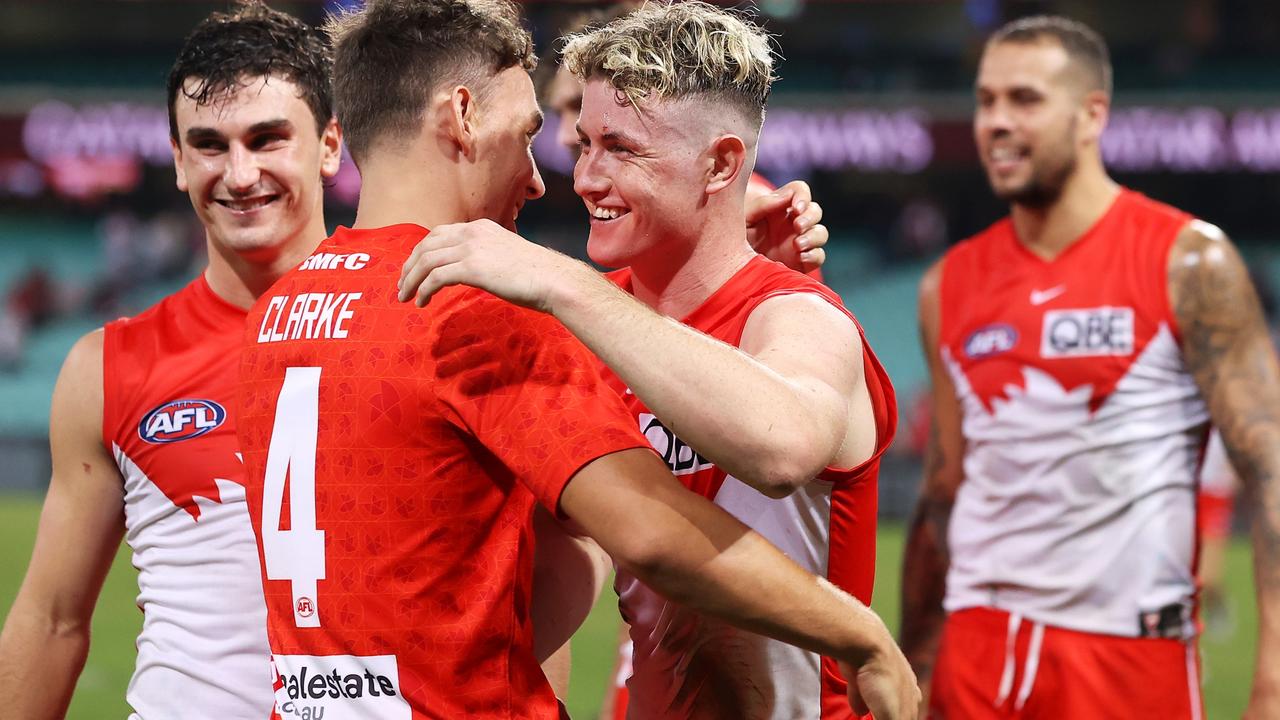 Ryan Clarke and Chad Warner celebrate victory over a disappointing Essendon. Picture: Mark Kolbe/Getty Images