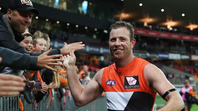 Steve Johnson celebrates with the crowd after the win. Picture: Phil Hillyard