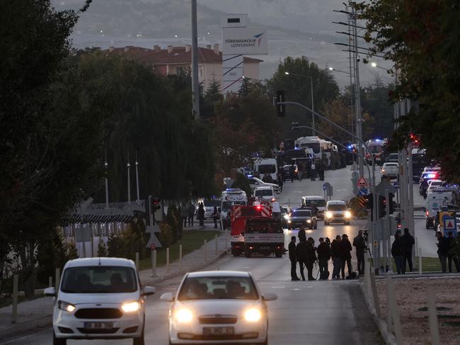 Turkish police officers secure part of the main road leading to the Turkish Aerospace Industries (TAI) building. Picture: AFP