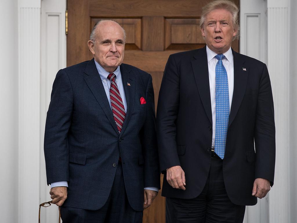 Rudy Giuliani stands with President Donald Trump. Picture: Drew Angerer / AFP / Getty